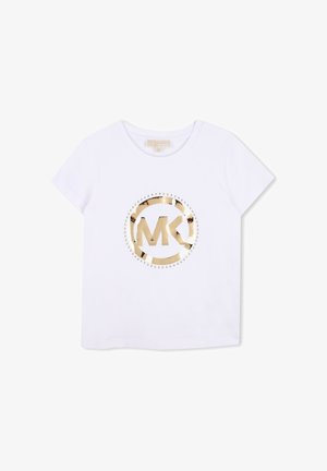 T-shirt blanc à manches courtes avec logo MK métallique doré à l'intérieur d'un cercle, orné de petits clous dorés autour du logo.
