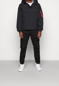 Alpha Industries Allvädersjacka - black