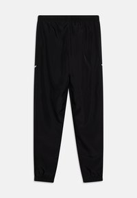 Black athletic pants with elastic waistband, featuring side pockets and white accent near the hem. Made from smooth, lightweight fabric.