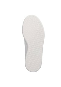 Semelle de sneaker blanche avec un motif hexagonal texturé. Design légèrement courbé avec un bord lisse et un côté renforcé pour la durabilité.