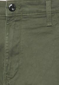 G-STAR BRONSON SLIM  - Chinos - bronze green