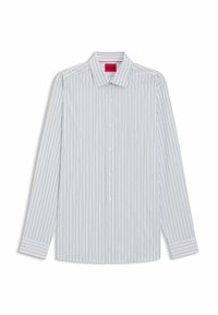 Langærmet skjorte i lyseblå med smalle lodrette striber. Har klassisk krave, knapstolpe foran og knaplukning ved ærmerne.