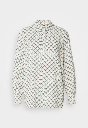 Chemise à manches longues crème avec un motif géométrique bleu. Dotée d'un col pointu et d'une fermeture à boutons. Texture de tissu douce.