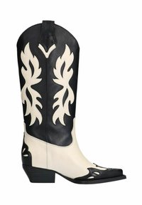 Bottes de cowboy noir et blanc avec un bout pointu, présentant des découpes en forme de flammes sur la tige, en cuir, et un talon empilé.