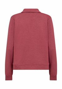 Pullover met lange mouwen en kraag, gemaakt van een gestructureerde stof in stoffig roze, met geribde manchetten en een losse pasvorm. Achteraanzicht toont een eenvoudig design.