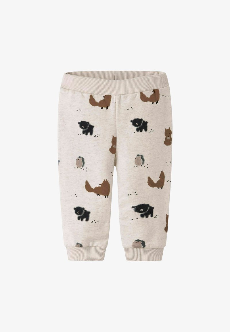 Pantalons en coton pour tout-petits avec un fond beige clair et des illustrations imprimées d'animaux en marron foncé, noir et gris. Taille élastique.