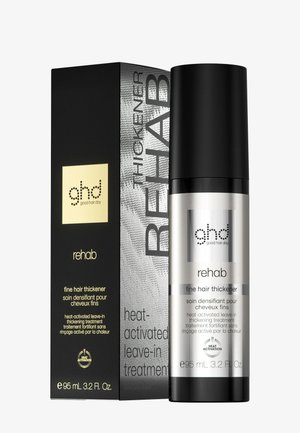 Traitement sans rinçage chauffant ghd Rehab, épaississant pour cheveux fins, flacon noir et argent à côté d'un emballage noir et argent, 95 ml.