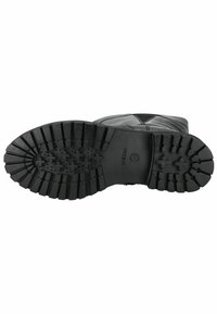 Botte noire imperméable avec une semelle extérieure en caoutchouc texturé dotée de profondes rainures et d'un bout rond, conçue pour l'adhérence et la durabilité.