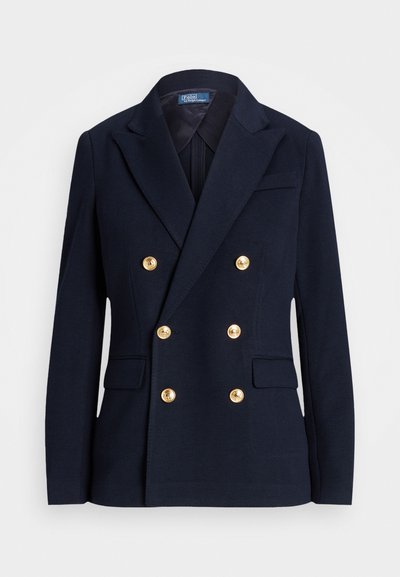 Blazer bleu marin cu două rânduri de nasturi, dintr-un material texturat, având butoane de culoare aurie, rever cu tăietură și două buzunare frontale.