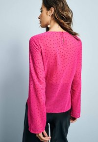 Next REGULAR FIT - BOW DETAIL SHEER - Bluse - bright pink flocked spot