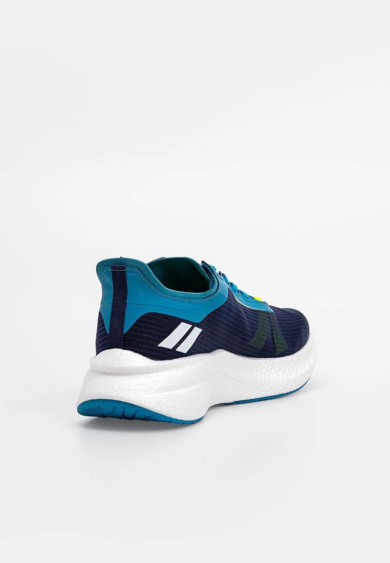 Zapatilla deportiva en color marino con parte superior texturizada, detalles en turquesa y suela de amortiguación blanca. Presenta marcas y una pestaña en el talón.