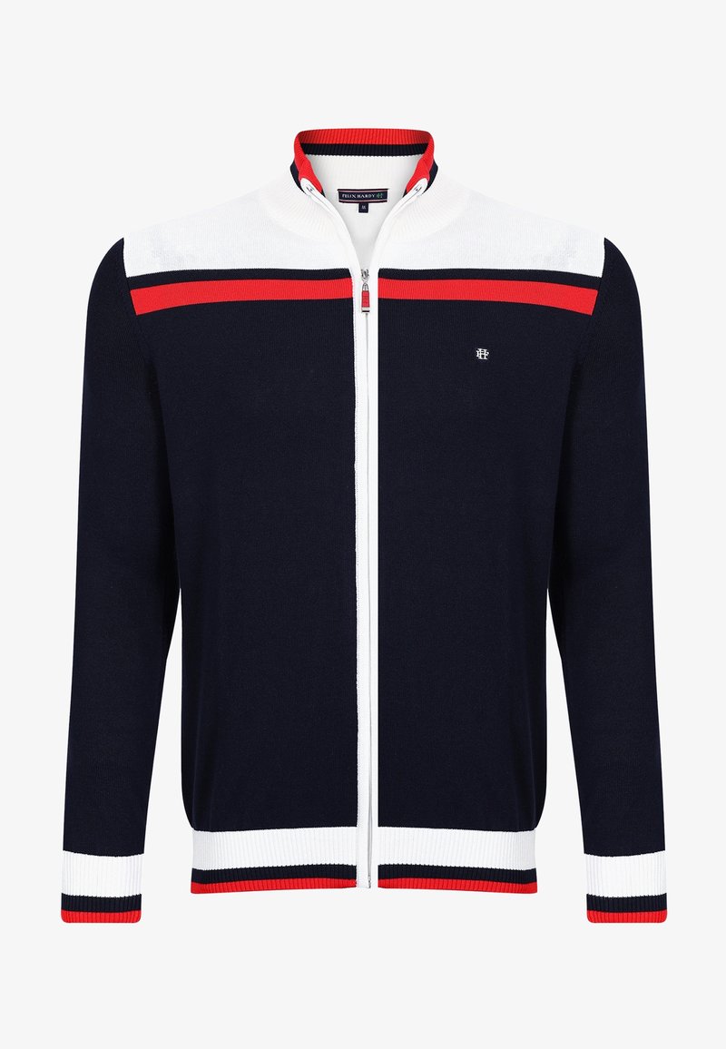 Full-zip navy blue sweater with white and red horizontal stripes across chest, white cuffs and hem with red and navy trim, and a stand collar.