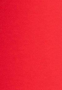 Red stretchy fabric with a ribbed texture, uniform color and smooth surface, suitable for various clothing applications.