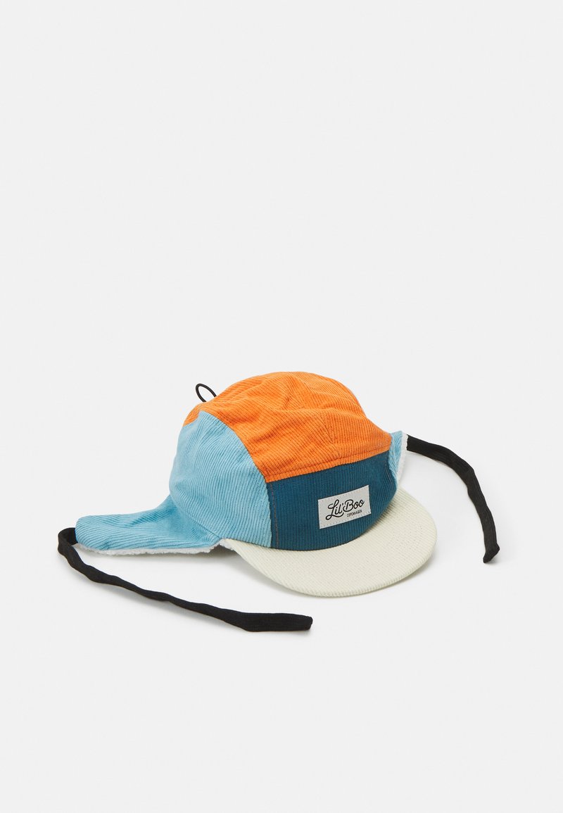 Multicolored corduroy hat featuring orange, blue, and teal panels, with a white brim and black chin straps. Includes a brand label patch.