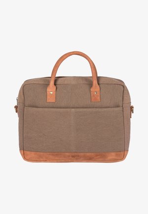 Brown canvas laptop bag with leather accents, dual handles, and a front pocket. Features a structured shape and stitched details.