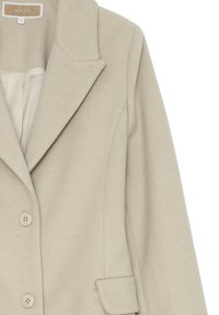 Blazer in lana textured beige con rever a punta, due bottoni e una tasca a busta sul lato destro, etichetta di taglia 12 all'interno del colletto.