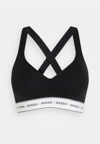 Svart bh med v-halsdesign, med kryssede stropper og et hvitt bånd med "GUESS" trykt rundt bunnen. Mykt materiale, sømløs.