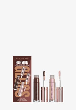 Mini-Lipgloss-Duo mit zwei Applikatoren. Ein Tube ist dunkelbraun, der andere ist hellrosa mit Schimmer. Verpackt in einer pinken Box.