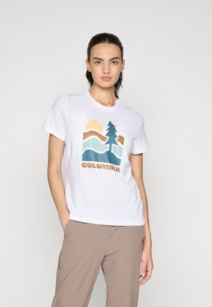 White cotton t-shirt featuring a graphic design with a tree, mountains, sun, and "COLUMBIA" text in shades of teal, brown, and yellow.