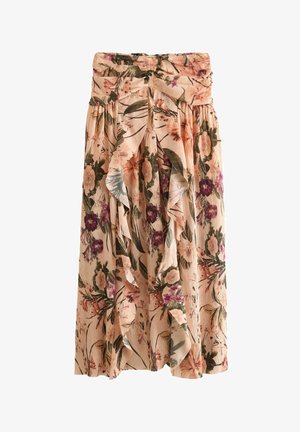 Jupe fleurie couleur pêche avec un volant sur le devant, taille élastique et mélange de motifs floraux verts, violets et roses.