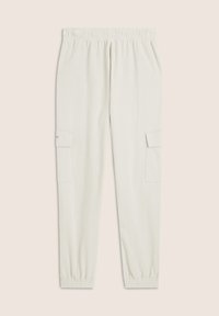 Pantaloni cargo di un beige chiaro con una vita elastica, polsini affusolati e due tasche laterali. Realizzati in un morbido tessuto testurizzato.
