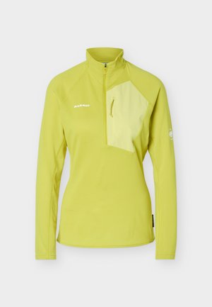 Világoszöld, hosszú ujjú sportfelső negyed cipzárral, kontrasztos mellzsebbel, valamint "Mammut" logóval a bal mellkason és az ujján.