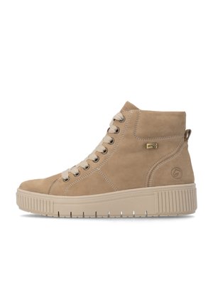 Tan suede high-top sneaker with light beige laces, thick textured sole, side stitching, and small metallic logo plaque near the ankle.