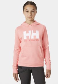 Sudadera rosa con bolsillo frontal, presenta un logo blanco "HH" y el texto "HELRY HANSEN". El material tiene una textura sutil; contiene una capucha con cordón.
