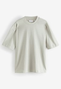 Lysegrå kortærmet t-shirt lavet af bomuld. Har en rund halsudskæring og en afslappet pasform med let sænkede skuldersømme.
