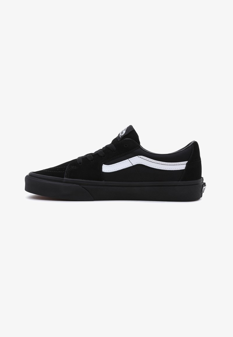 Black sneakers made of suede and canvas, featuring a white side stripe, black rubber sole, and classic lace-up design.