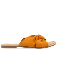 Infradito piatti con tomaia in suede arancione e design annodato, suola marrone e texture liscia. Stile open-toe senza chiusure.
