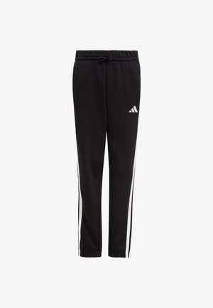 Pantalones deportivos negros con franjas laterales blancas, cinturilla elástica y cordón. Presentan el logo de Adidas en el muslo izquierdo.