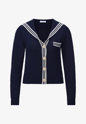 Cardigan blu navy lavorato a maglia con colletto bianco in stile marinaresco e righe, bottoni frontali e una piccola tasca sul petto sinistro.