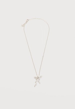 Silver chain necklace with a circular clasp and two twisted, rhinestone-studded tassels hanging below the clasp.