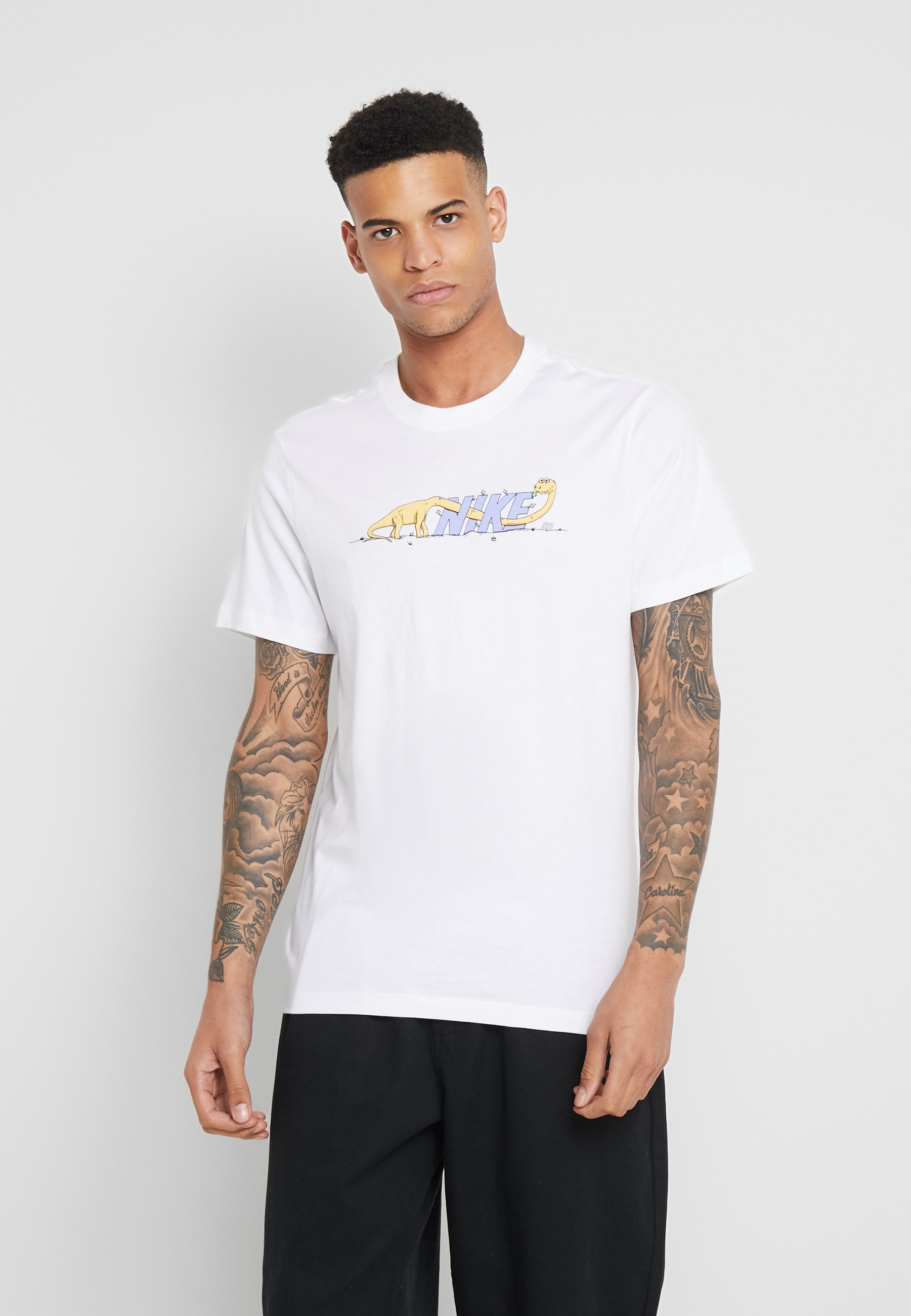 nike dinosaur tee