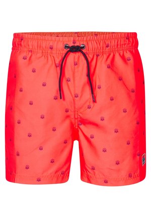 Punaiset uimapantsit kevyestä kankaasta, jossa on naru vyötäröllä, pieniä auringon kuvioita tummansinisinä ja sivussa logo-patch.