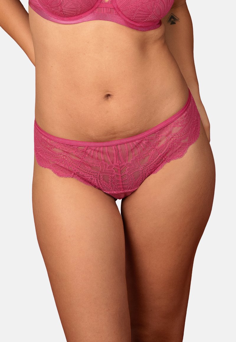 Pink lace panties with a sheer design, featuring floral patterns, scalloped edges, and a comfortable waistband. Soft texture.