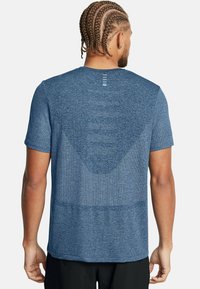 Under Armour SEAMLESS STRIDE - T-Shirt sport - horizon blue
