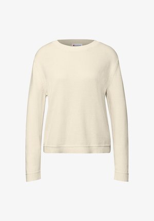 Krémově zbarvený svetr z měkkého pleteného materiálu s dlouhými rukávy, kulatým výstřihem a žebrovanými manžetami, volného střihu.