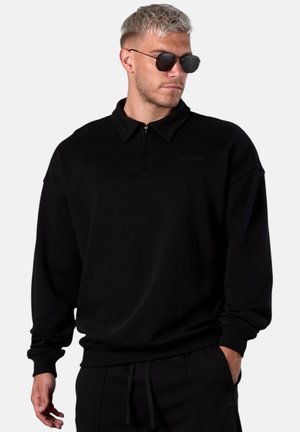 HALFZIP - Polo shirt - black