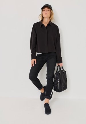 Tamaris Loaferit/pistokkaat - black uni