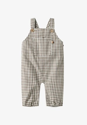 Brun- och vitrutiga hängselbyxor med justerbara axelband, träknappar och en framficka; elastiska muddar vid anklarna. Bomullsmaterial.
