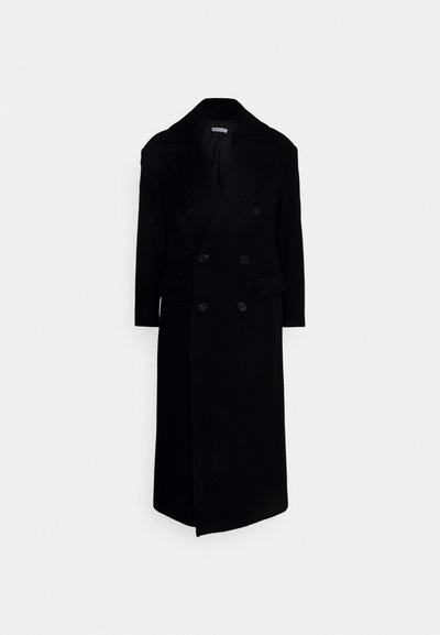Casaco preto de lã duplo, com grandes lapelas, mangas longas e dois bolsos frontais. Feito de um tecido de mistura de lã texturizado.