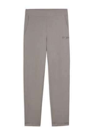 Pantaloni della tuta color grigio chiaro, aderenti, con tasche frontali e piccolo dettaglio testuale "FREDDY" sulla coscia destra.