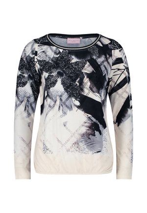 Langsleeve top met een zwart-wit abstract bloemenpatroon op een lichte achtergrond, gemaakt van zacht materiaal met een geplooide zoom.