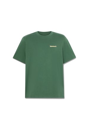 Grünes Baumwoll-T-Shirt mit lockerem Schnitt. Verfügt über einen Rundhalsausschnitt und ein kleines goldenes Timberland-Logo auf der Brust. Weiche Textur.