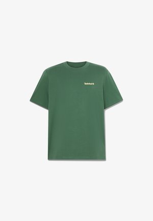 Grünes Baumwoll-T-Shirt mit lockerem Schnitt. Verfügt über einen Rundhalsausschnitt und ein kleines goldenes Timberland-Logo auf der Brust. Weiche Textur.