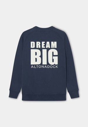 Sudadera azul marino de manga larga con texto blanco "DREAM BIG ALTONADOCK" en la parte posterior sobre un fondo liso.