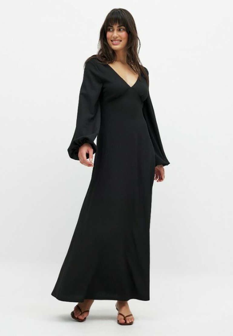 Black maxi dress with a V-neck, long bell sleeves, and a fitted silhouette. Smooth texture with a solid color and no visible patterns.