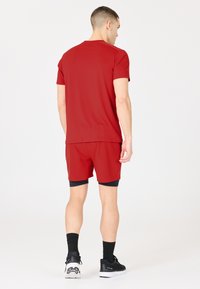 Endurance Dubbla shorts -  urban red